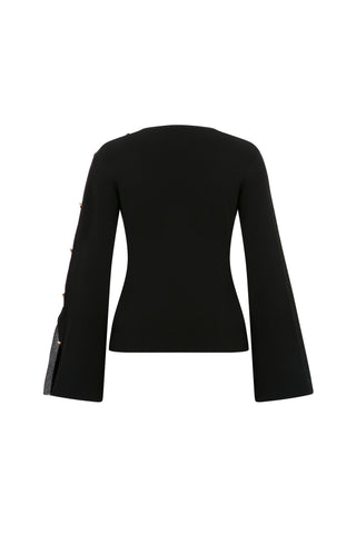 Long-sleeved black knit sweater with button detail