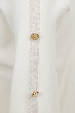 Long-sleeved button-detailed off-white knit sweater